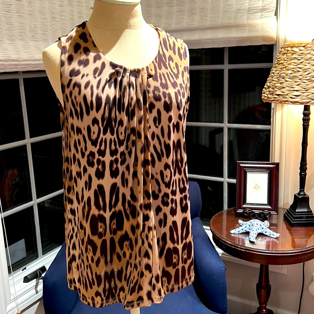 Anne Klein leopard print sleeveless top. With pleats at  neckline in  front.